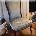 F39. Low Victorian parlor chair with casters and velvet upholstery. 
